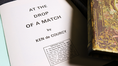 At the Drop of a Match | Ken De Courcy